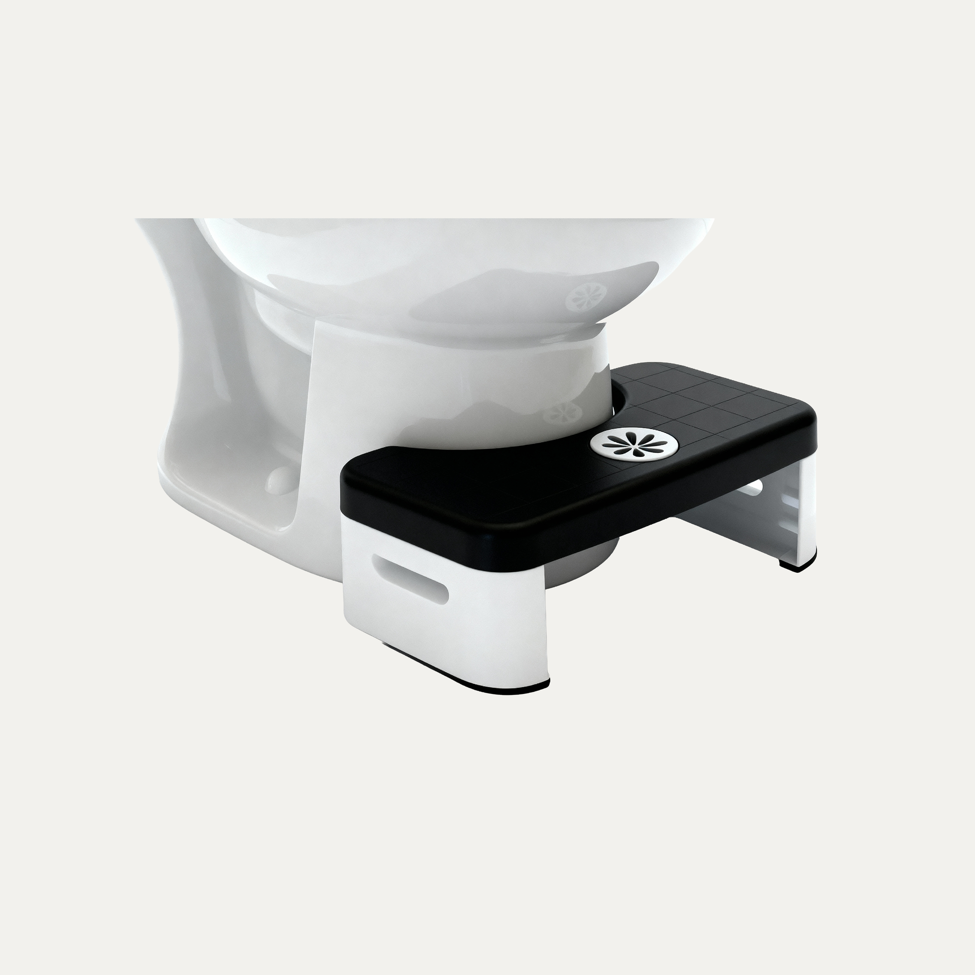 Black footstool hugging the bottom of a white toilet on a light gray background