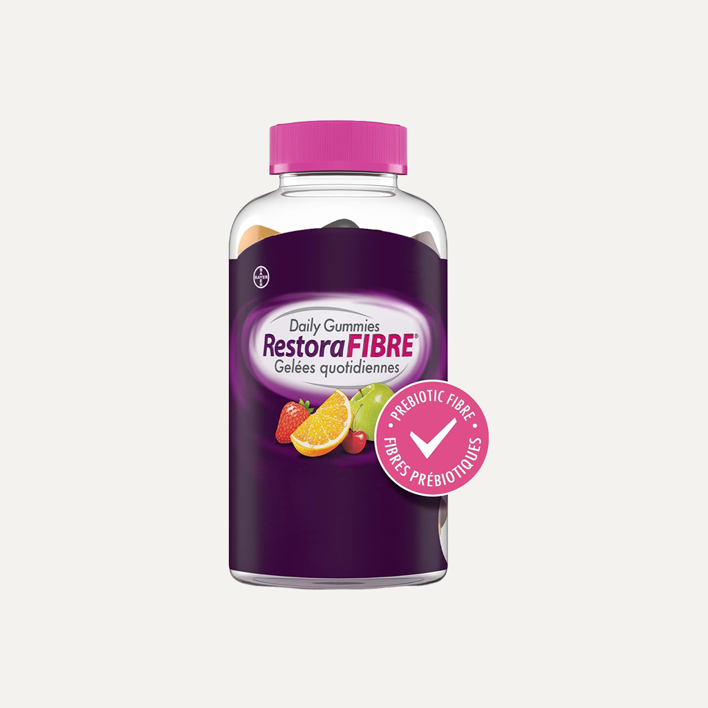 Bottle of RestoraFibre daily prebiotic gummies on a white background