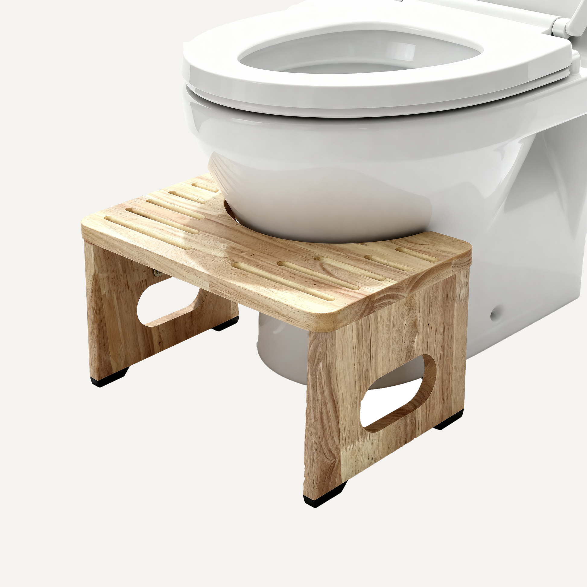 Wooden toilet stool in front of a white toilet on a white background